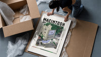 Vintage Macintosh computer with plants framed print being unpacked from protective bubble wrap and a box