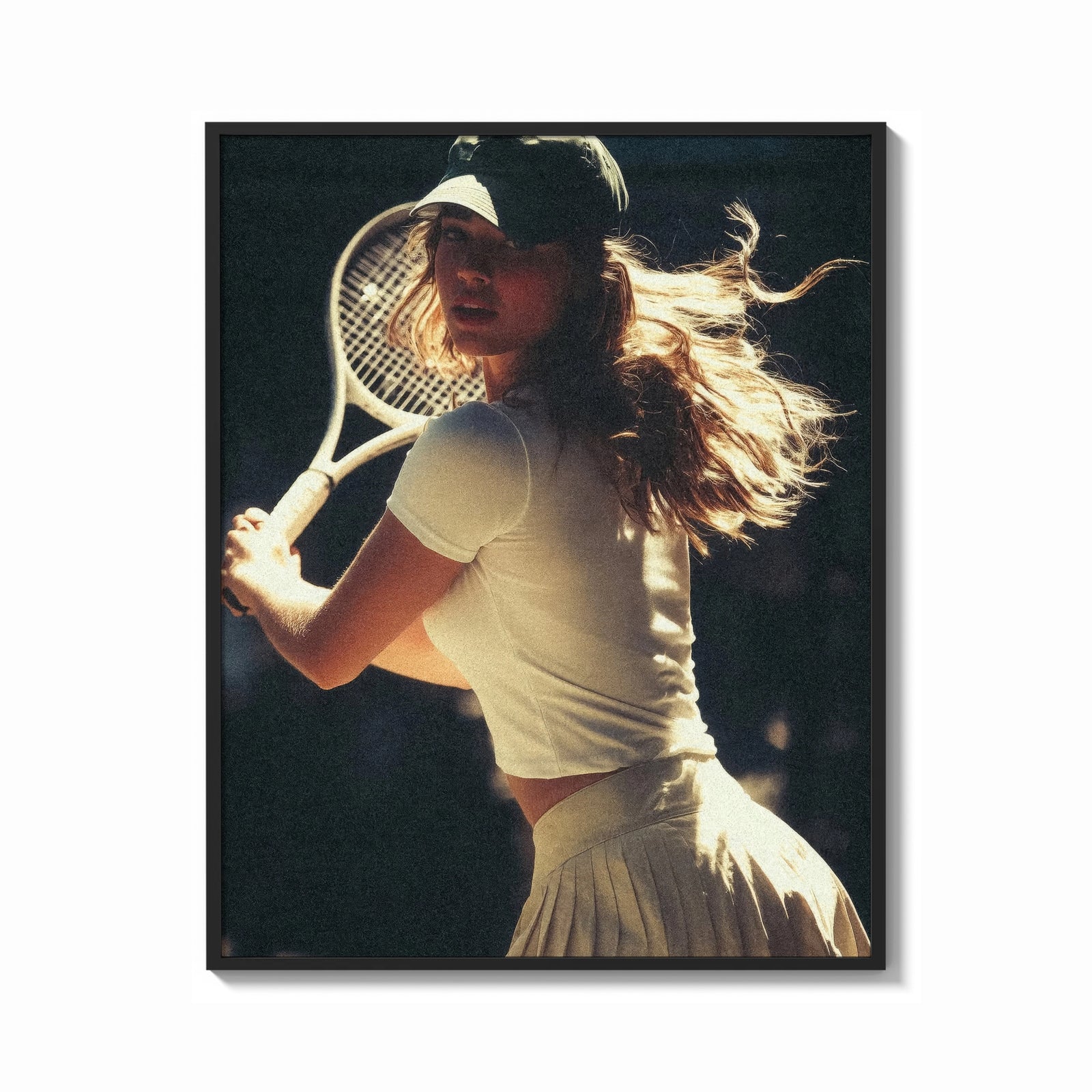 Framed vintage tennis serve print shown as a bold statement piece on a clean gallery wall
