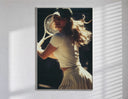 vintage tennis serve poster in a slim frame on a bright wall with soft window light