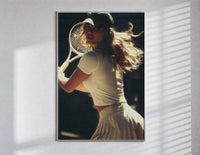 vintage tennis serve poster in a slim frame on a bright wall with soft window light