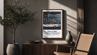White convertible car with elegant couples poster framed above a fluted sideboard beside an olive tree