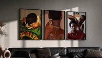 Waves, Line-Up and Braids Set of 3 in black frames on a grey wall above a leather sofa