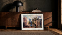 Westminster Abbey and St Margaret's Church print in a black frame leaning against a walnut console in lamplight