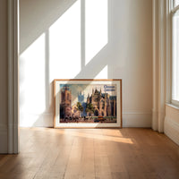 Westminster Abbey and St Margaret's Church print in an oak frame on a sunlit wood floor beneath tall window light