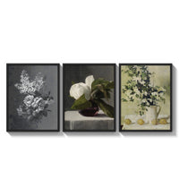 Floral still life triptych paintings three-panel set arranged as a triptych on a bright gallery wall