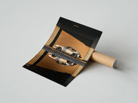 Gently curled White 911 Hangar Sunset Reflection print beside its protective shipping tube