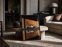 White 911 Hangar Sunset Reflection print on the floor, leaning against a travertine table
