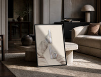 White Sneakers with Cream Trousers print on the floor, leaning against a travertine table