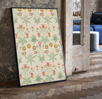 Vintage floral pattern with daisies print in a black frame leaning beside a vintage door on parquet