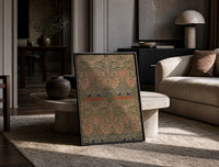 Floral bird damask textile pattern print in a black frame leaning on a travertine table in a sunlit lounge