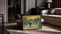 Winter Village Christmas Greetings print in a black frame leaning on a rug beside a beige sofa