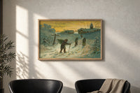 Winter Village Christmas Greetings print in an oak frame on a sunlit wall above two leather armchairs