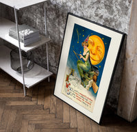 Witch riding broomstick past moon poster in a black frame leaning beside a shelf in a raw-plaster loft