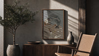 Woman in Heart Hoops and Sunglasses poster framed above a fluted sideboard beside a potted tree