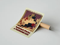 Rolled Southwest pueblo cliff dwellings poster beside its crush-resistant kraft shipping tube
