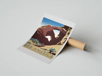 Rolled Desert rock arch with riders poster beside its crush-resistant kraft shipping tube