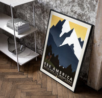 Cowboy on horse viewing mountains poster in a black frame leaning beside a shelf in a raw-plaster loft